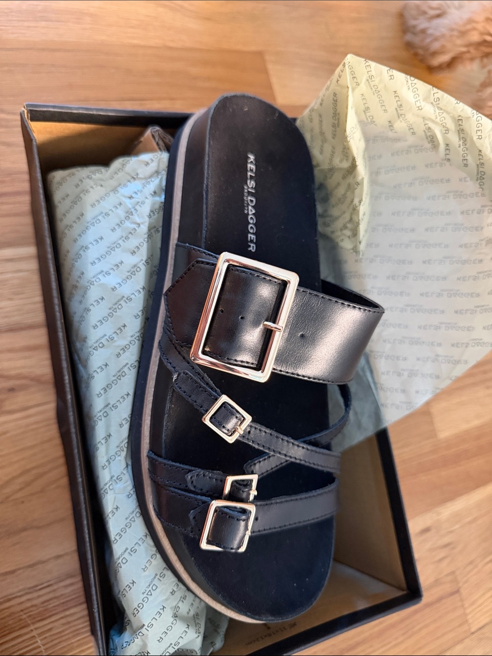 Kelsi Dagger Black Slide Sandal with Gold Buckles